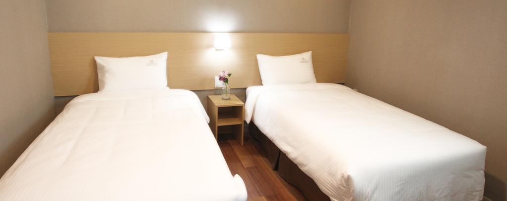 Business Hotel Haeundae S Busan Quarto foto